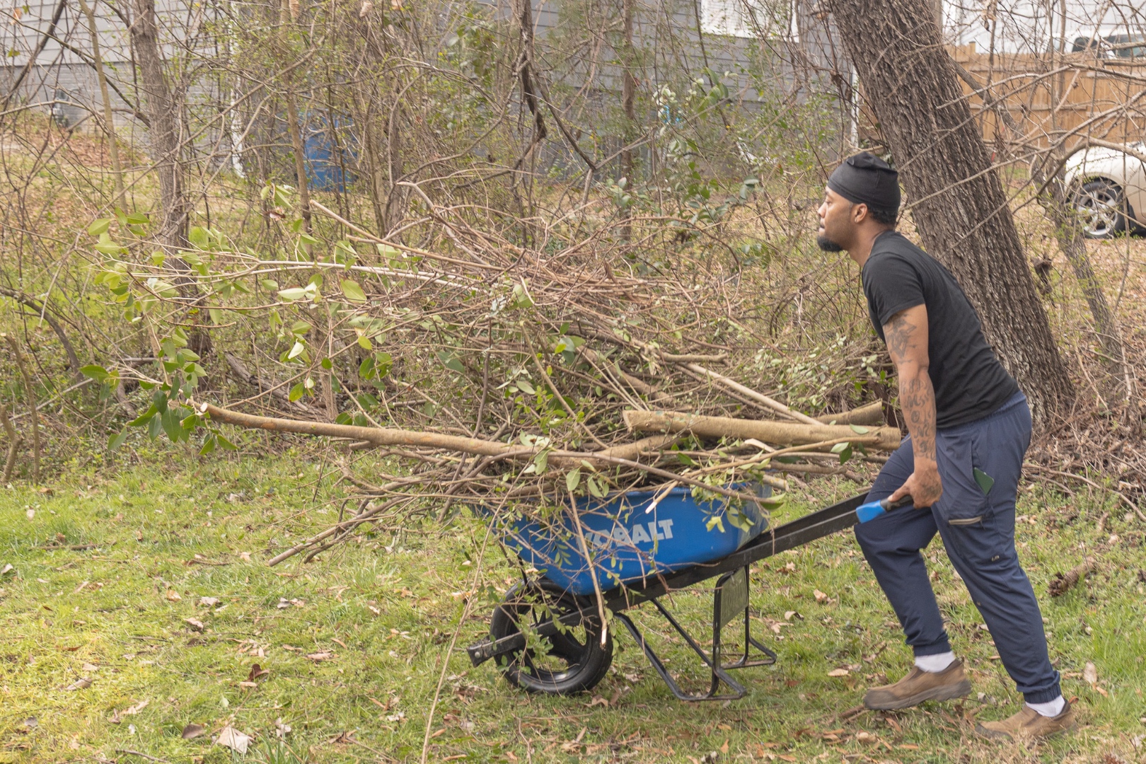 Crew member hauling debris